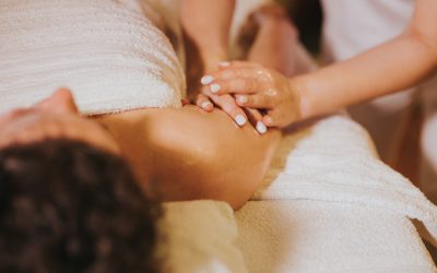 A female getting a professional massage in a beauty spa salon